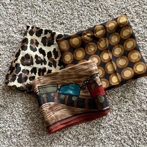 Set of Three Patterned Scarves in different shades of Browns and Black.